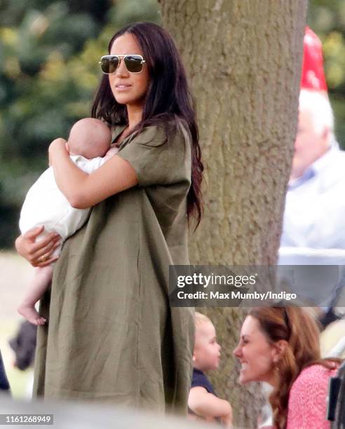 Meghan, Duchess of Sussex, Archie Harrison Mountbatten-Windsor, Prince Louis of Cambridge and Catherine, Duchess of Cambridge attend the King Power...