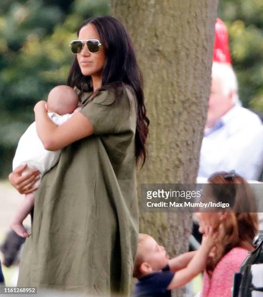 Meghan, Duchess of Sussex, Archie Harrison Mountbatten-Windsor, Prince Louis of Cambridge and Catherine, Duchess of Cambridge attend the King Power...