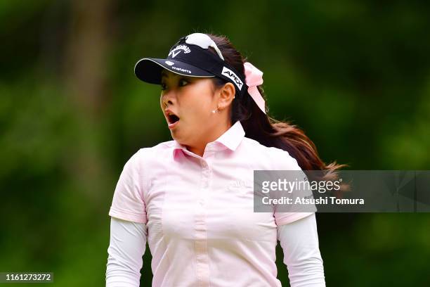 Yui Kawamoto of Japan is surprised after making a hole-in-one on the 11th hole during the first round of the Nippon Ham Ladies Classic at Katsura...
