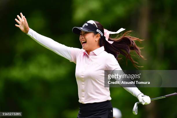 Yui Kawamoto of Japan celebrates after making a hole-in-one on the 11th hole during the first round of the Nippon Ham Ladies Classic at Katsura Golf...