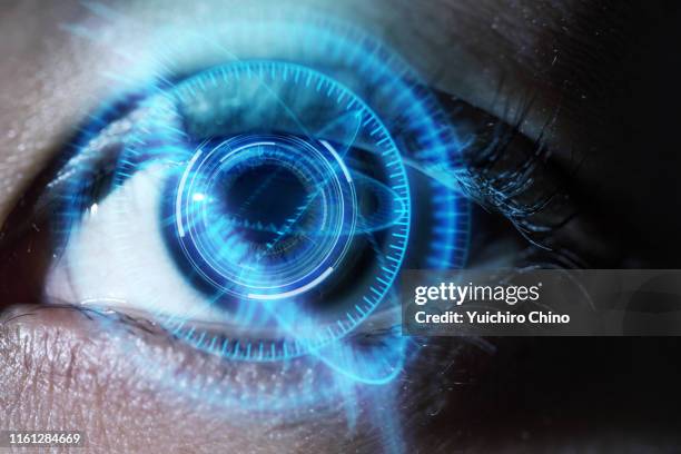human eye with using the futuristic technology - supporting functions for graphical user interface stock-fotos und bilder