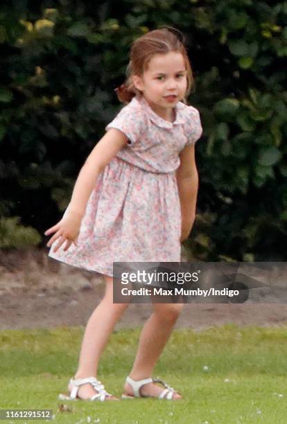 Princess Charlotte of Cambridge attends the King Power Royal Charity Polo Match, in which Prince William, Duke of Cambridge and Prince Harry, Duke of...