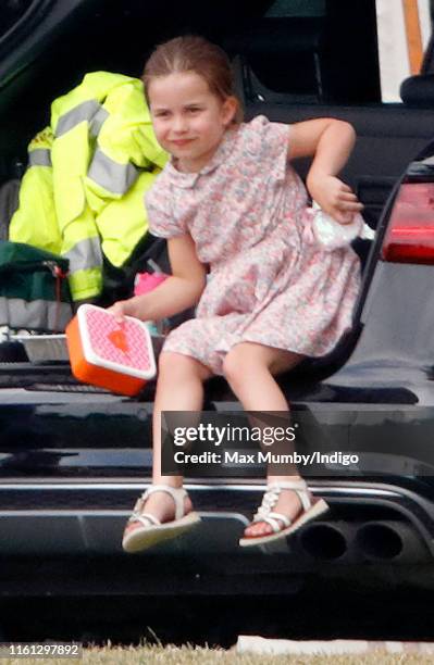 Princess Charlotte of Cambridge attends the King Power Royal Charity Polo Match, in which Prince William, Duke of Cambridge and Prince Harry, Duke of...