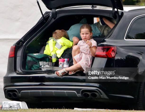 Princess Charlotte of Cambridge and Prince George of Cambridge attend the King Power Royal Charity Polo Match, in which Prince William, Duke of...