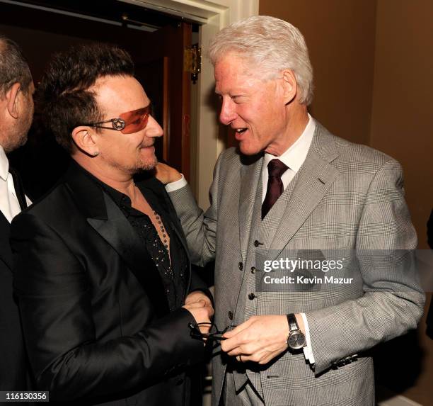 Bono of U2 and President Bill Clinton backstage at "Spider-Man Turn Off The Dark" Broadway opening night at Foxwoods Theatre on June 14, 2011 in New...