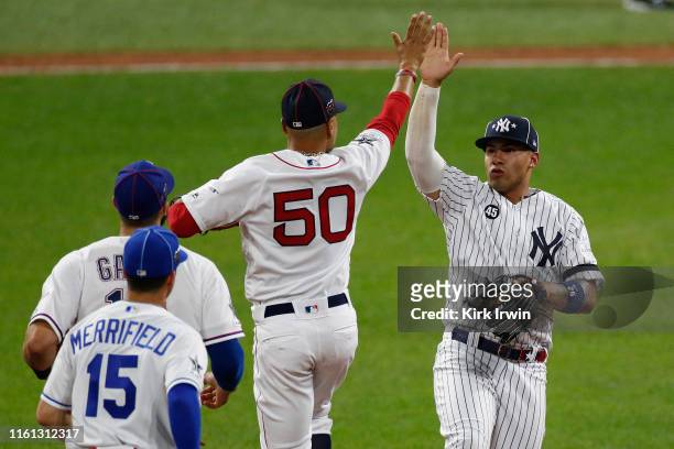 Gleyber Torres of the New York Yankees and Mookie Betts of the Boston Red Sox during the 2019 MLB All-Star Game at Progressive Field on July 09, 2019...
