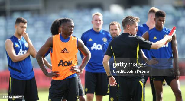 Diogo Dalot, Aaron Wan-Bissaka, Phil Jones, Juan Mata, Marcus Rashford of Manchester United in action during a first team training session as part of...
