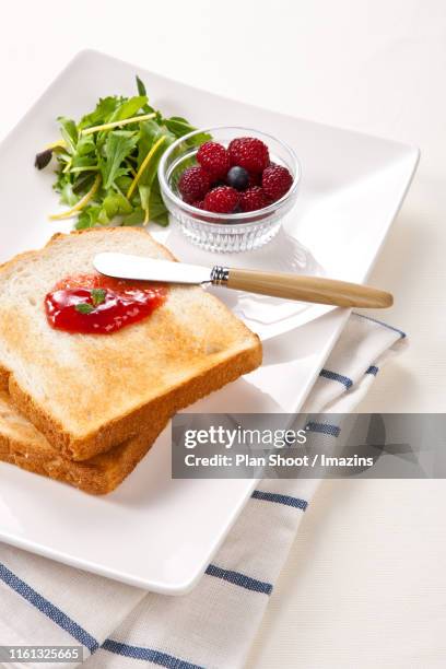 jam on toast - butter knife stock pictures, royalty-free photos & images