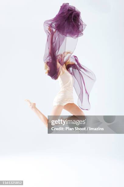 purple cloth and motion - swaying stock pictures, royalty-free photos & images