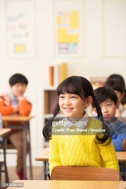 a child telling her opinion in class - south korea school stock pictures, royalty-free photos & images