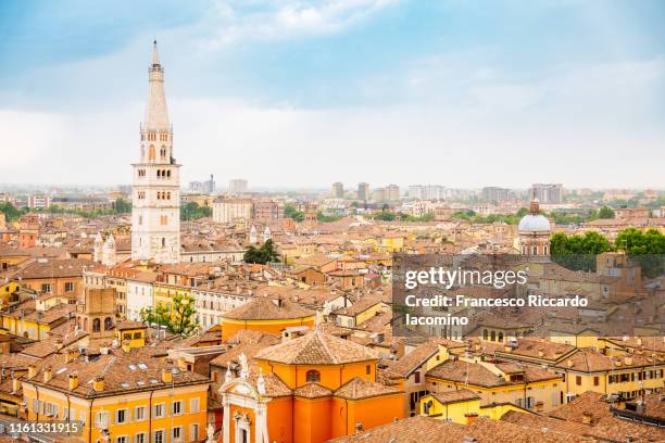 modena, cityscape and ghirlandina tower from a vantage point of view. emilia romagna, italy - iacomino italy stock-fotos und bilder