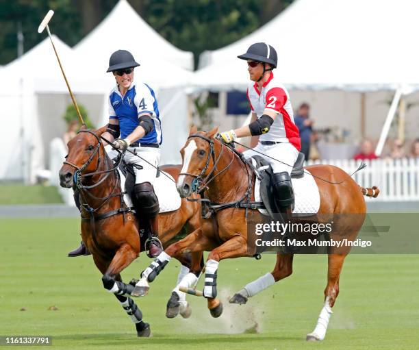 Prince William, Duke of Cambridge and Prince Harry, Duke of Sussex take part in the King Power Royal Charity Polo Match for the Khun Vichai...