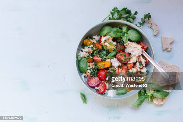 small tomatoes with mozzarella cheese, basil and balsamico vinegar - salad bowl stock pictures, royalty-free photos & images