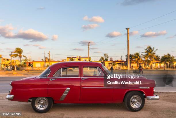 parked red vintage car, havana, cuba - old car side view stock pictures, royalty-free photos & images