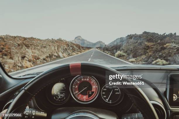 personal perspective in a car, road teide national park, tenerife, spain - car point of view stock pictures, royalty-free photos & images