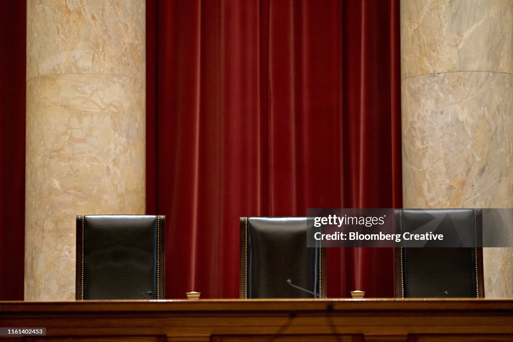 Three Leather Chairs In A Courtroom