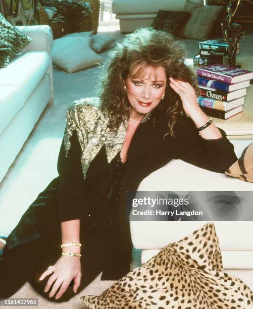 Author Jackie Collins poses for a portrait in 1988 in Los Angeles, California.