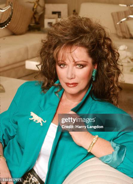 Author Jackie Collins poses for a portrait in 1988 in Los Angeles, California.