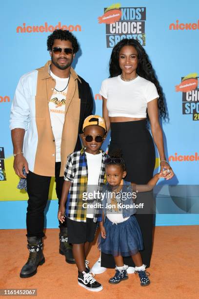 Russell Wilson and Ciara with Future Zahir Wilburn and Sienna Princess Wilson attend Nickelodeon Kids' Choice Sports 2019 at Barker Hangar on July...