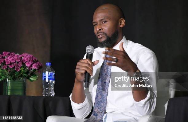 Keyon Dooling, who played 13 seasons in the NBA, speaks during the Bridging the Gap Summit to discuss the transition into life after basketball...