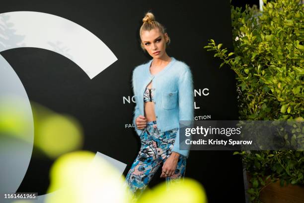 Stella Maxwell attends the Noir et Blanc de Chanel Fall/Winter 2019 Makeup Collection - Yachts De Paris on July 11, 2019 in Paris, France.