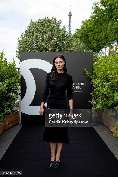 Phoebe Tonkin attends the Noir et Blanc de Chanel Fall/Winter 2019 Makeup Collection - Yachts De Paris on July 11, 2019 in Paris, France.