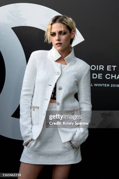 Kristen Stewart attends the Noir et Blanc de Chanel Fall/Winter 2019 Makeup Collection - Yachts De Paris on July 11, 2019 in Paris, France.