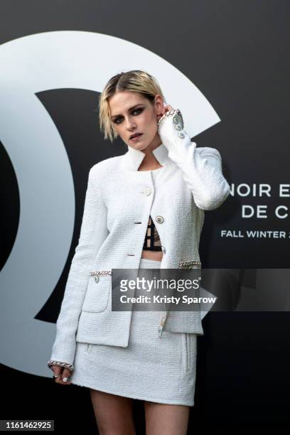 Kristen Stewart attends the Noir et Blanc de Chanel Fall/Winter 2019 Makeup Collection - Yachts De Paris on July 11, 2019 in Paris, France.