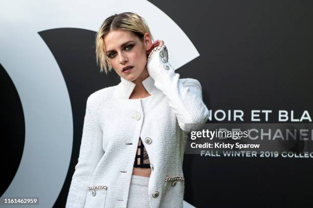 Kristen Stewart attends the Noir et Blanc de Chanel Fall/Winter 2019 Makeup Collection - Yachts De Paris on July 11, 2019 in Paris, France.