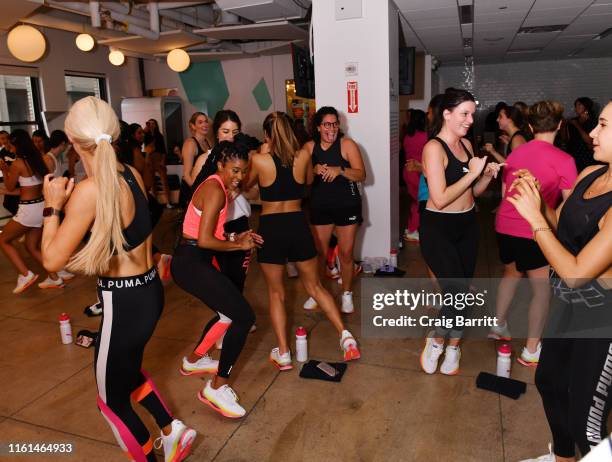 Deja Riley leads a high-intensity workout class as PUMA And Refinery29 Host The Launch Of The New PUMA LQD CELL Shatter Shoe at Refinery29 on July...