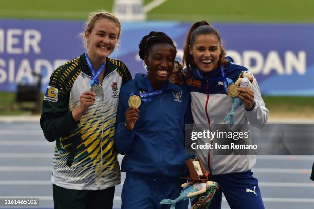 Women's 400 m Hurdles Final podium with Zeney Van Der Walt of South Africa silver medal, Ayomide Folorunso of Italy gold medal and Amalie Iuel of...