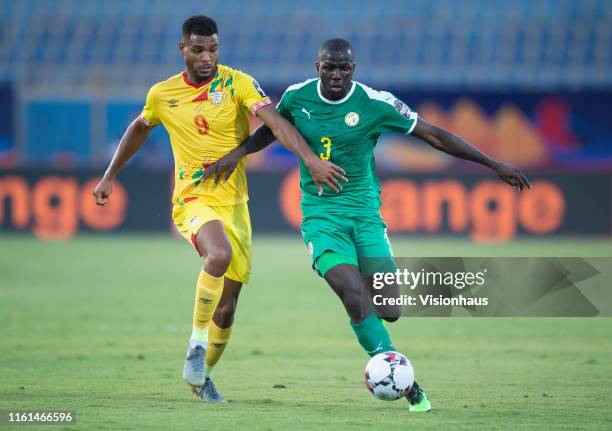 Steve Mounie of Benin and Kalidou Koulibaly of Senegal during the 2019 Africa Cup of Nations quarter-final match between Senegal and Benin at 30th...