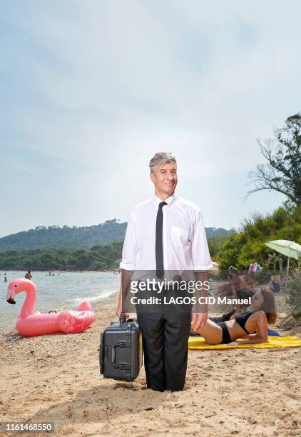The italian artist Maurizio Cattelan is photographed for Paris Match on the beach on July 07, 2019 in Porquerolles, France.