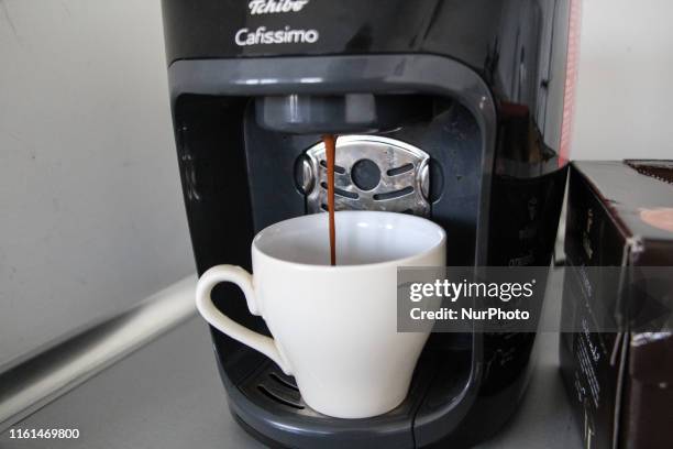 Cup of coffee in the Tschibo Cafissimo coffee maker is seen in Gdynia, Poland on 13 August 2019 Despite efforts to encourage recycling, hundreds of...