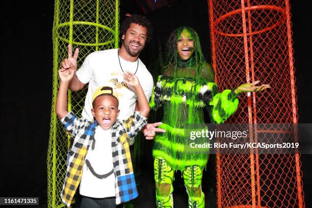 Future Zahir Wilburn, Russell Wilson and Ciara smile after Ciara was slimed at Nickelodeon Kids' Choice Sports 2019 at Barker Hangar on July 11, 2019...