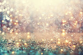 Snowflakes on an abstract shiny light background