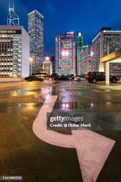 twilight over hong kong island central business district - chevron stock pictures, royalty-free photos & images