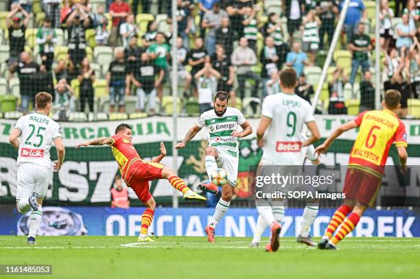 Patryk Klimala from Jagiellonia Bialystok and Blazej Augustyn from Lechia Gdansk are seen in action during the PKO Ekstraklasa League match between...