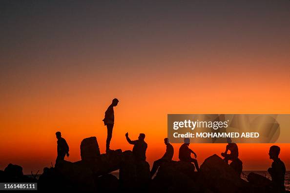 TOPSHOT-GAZA-RELIGION-ISLAM-EID-ADHA-PALESTINIAN TOPSHOT-GAZA-RELIGION-ISLAM-EID-ADHA-PALESTINIAN