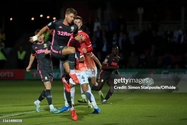 Gaetano Berardi of Leeds scores their 2nd goal during the Carabao Cup First Round match between Salford City and Leeds United at Moor Lane on August...