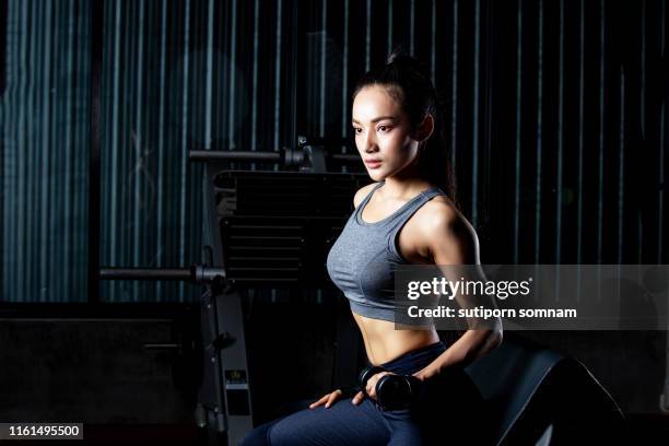 asian women exercise workout in gym fitness breaking - core strength stock pictures, royalty-free photos & images