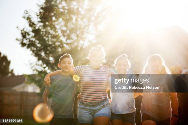 four adolescent friends - cousin stock pictures, royalty-free photos & images
