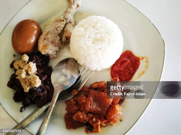 indonesian food called gudeg - gudeg stock pictures, royalty-free photos & images