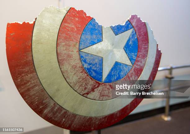 Real-life props from the film including Captain America's shield on display during the 'We Love You 3000' Tour at Best Buy in celebration of the...
