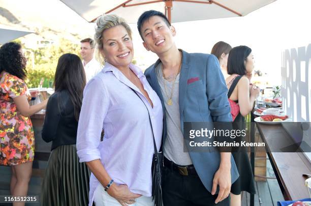 Elizabeth Epie and Jake Choi attend Breguet Marine Collection Launch at Little Beach House Malibu on July 11, 2019 in Malibu, California.