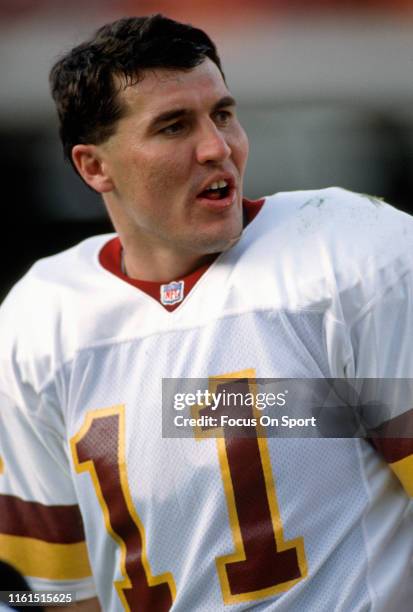 Mark Rypien of the Washington Redskins looks on during an NFL football game circa 1991. Rypien played for the Redskins from 1986-93.