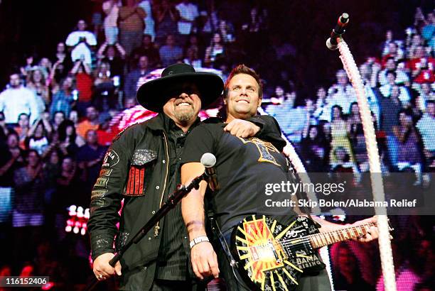 Eddie Montgomery and Troy Gentry of Montgomery Gentry perform onstage during Bama Rising: A Benefit Concert For Alabama Tornado Recovery at the...