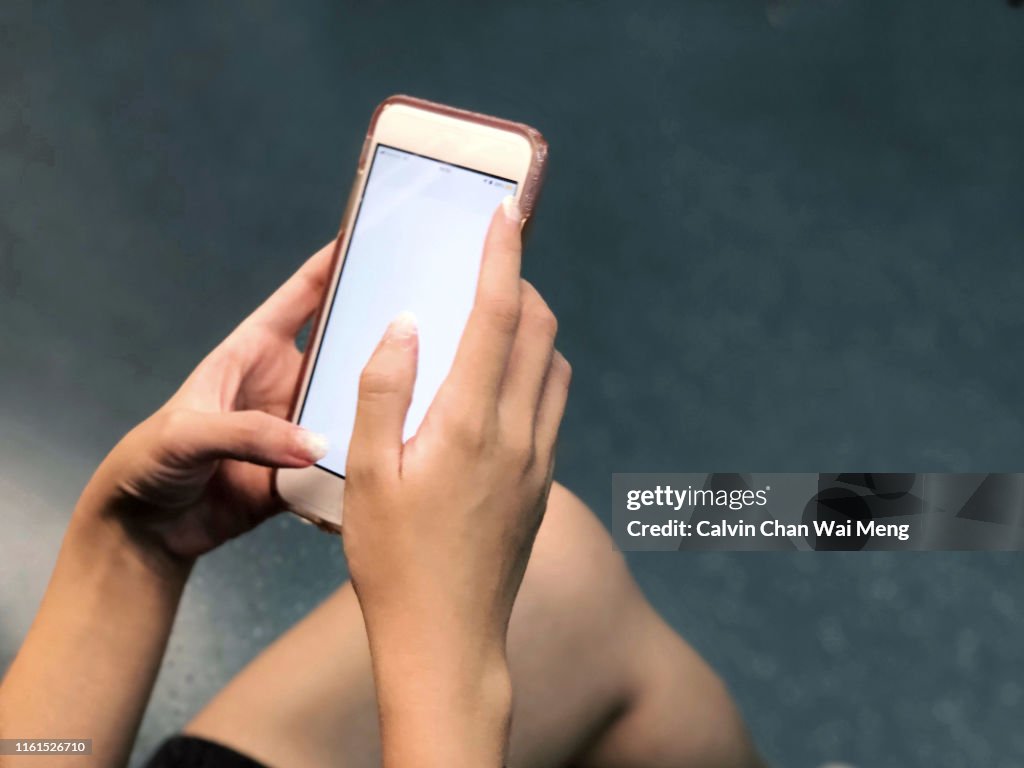 Using Moble Phone Using Mobile Phone High-Res Stock Photo - Getty Images