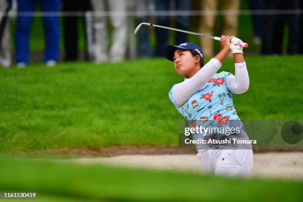 Ai Suzuki of Japan hits out from a bunker on the 9th hole during the second round of the Nippon Ham Ladies Classic at Katsura Golf Club on July 12,...