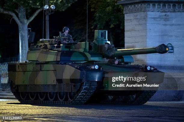 French tank Leclerc drives down the Champs Elysee during the Bastille Day military ceremony rehearsals on July 12, 2019 in Paris, France. The...